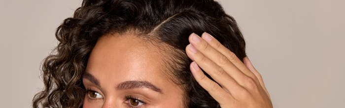 woman showing hair line and scalp